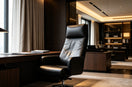 Modern luxury executive office. Black leather office chair matched with walnut desk, simple and elegant space.
