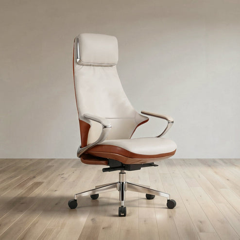 A modern high-back office chair with cream leather upholstery and brown wood-look side panels, mounted on a chrome five-star wheeled base, set against a minimalist beige wall and light wood floor.