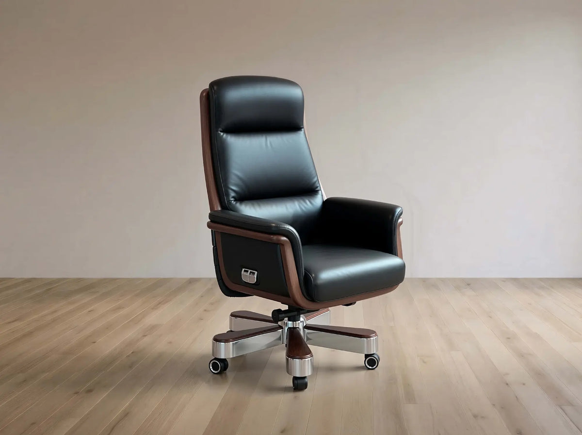 A high-back black leather office chair with brown wood-look side panels and a chrome five-star wheeled base, shown in a minimalist room with light wood flooring and a beige wall.