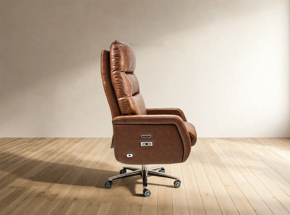 A brown leather high-back executive office chair with a chrome five-star wheeled base, shown in a side profile against a minimalist beige wall and light wood floor.
