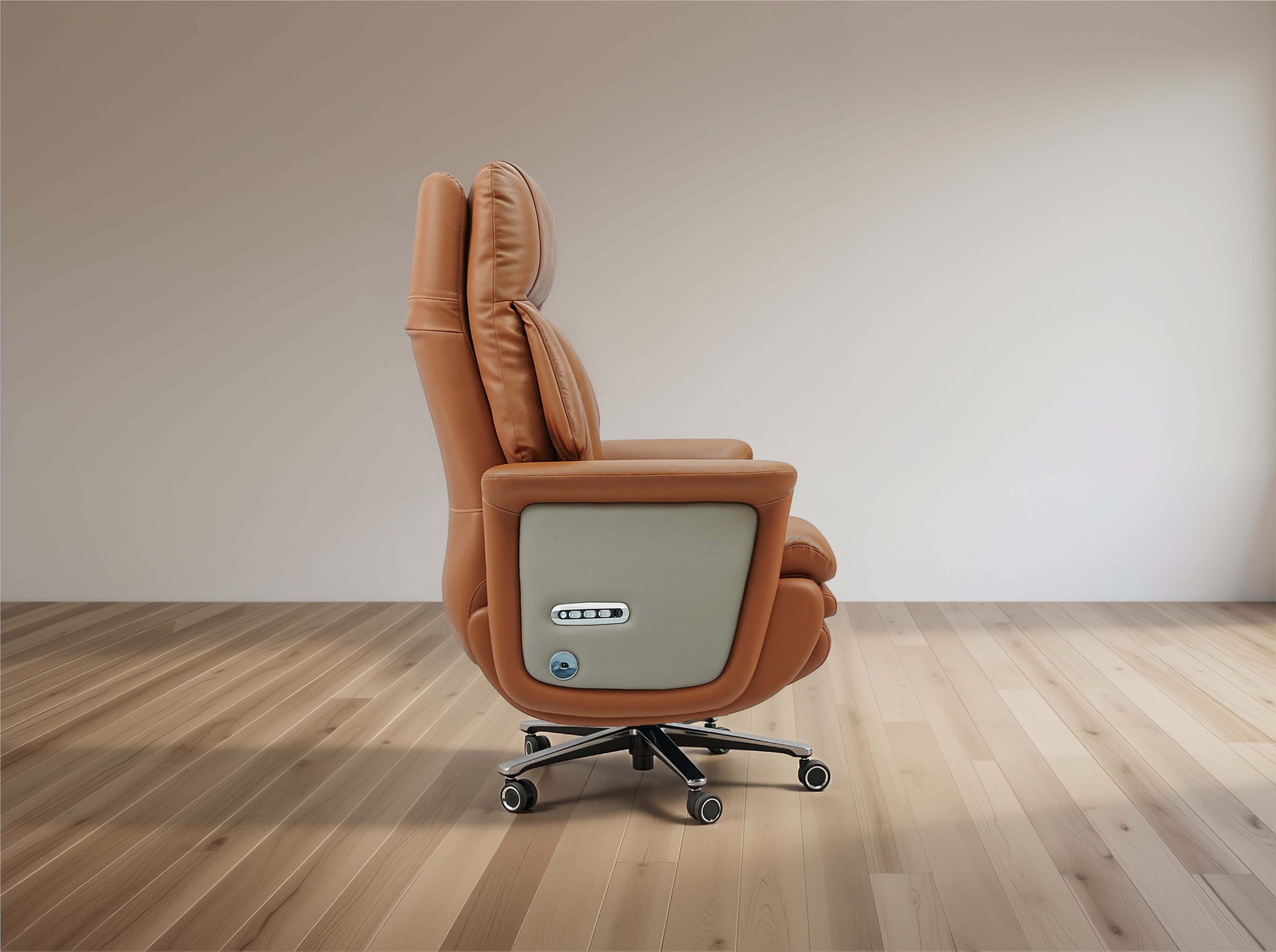 Brown recliner chair on a wooden floor with a plain wall background