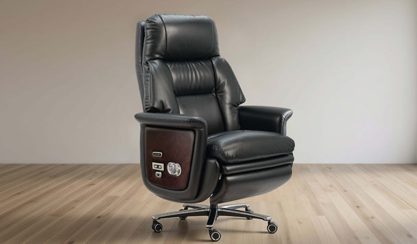 Black leather recliner chair on a wooden floor with a plain wall background